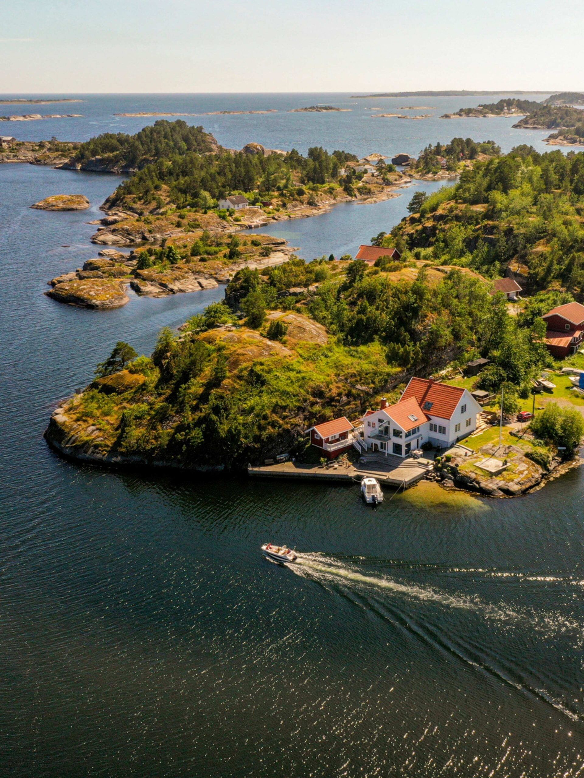 Boat among the fjords and archipelagos in southern norway.